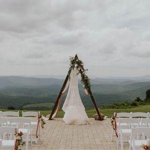 Lings moment arch drapes and florals